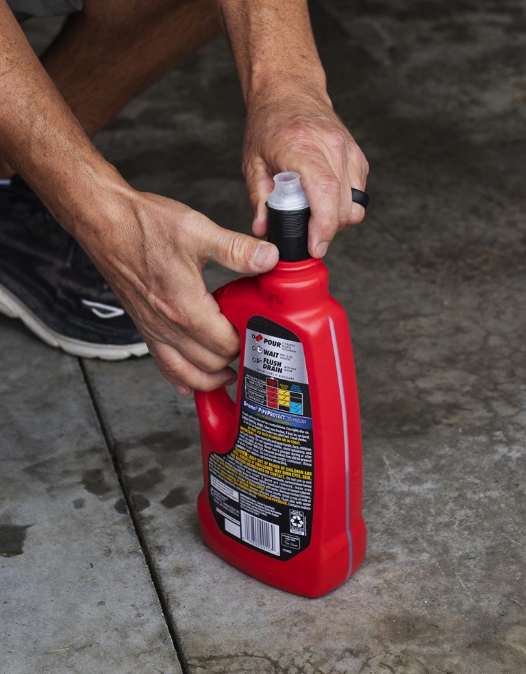 pull pour spout shown on a bottle of Drano, collapsed